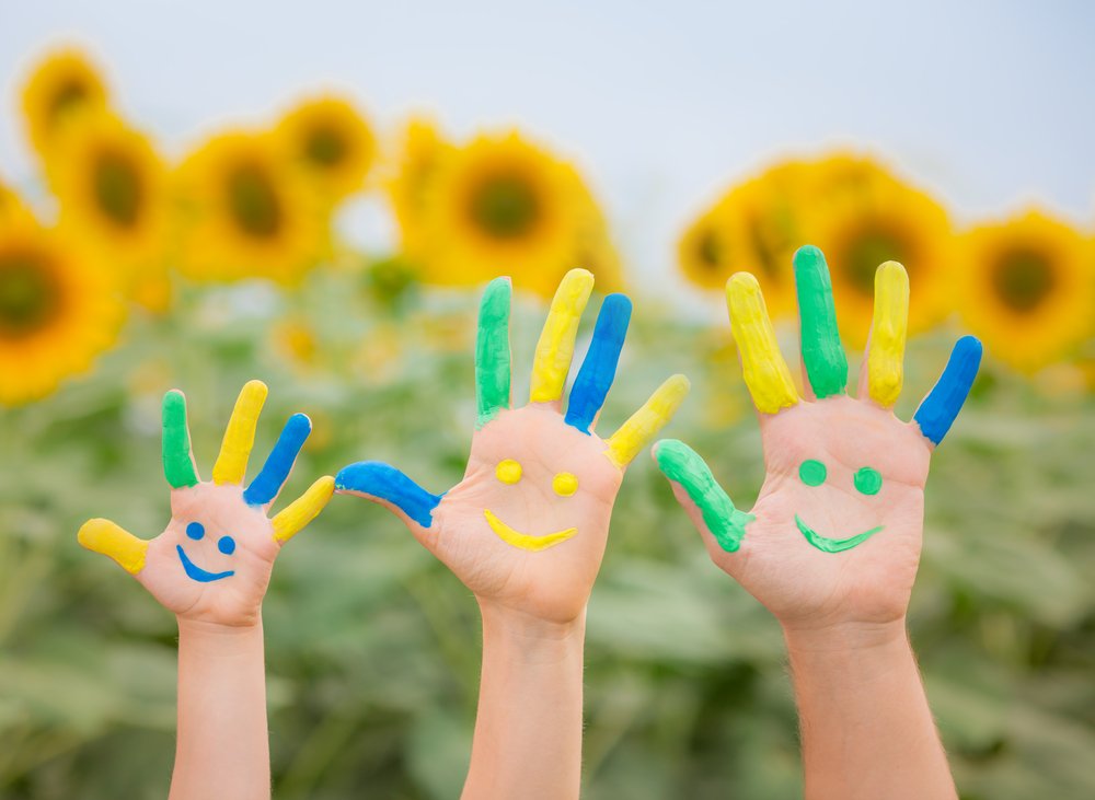 Children’s painted hands for child-centred business data privacy article